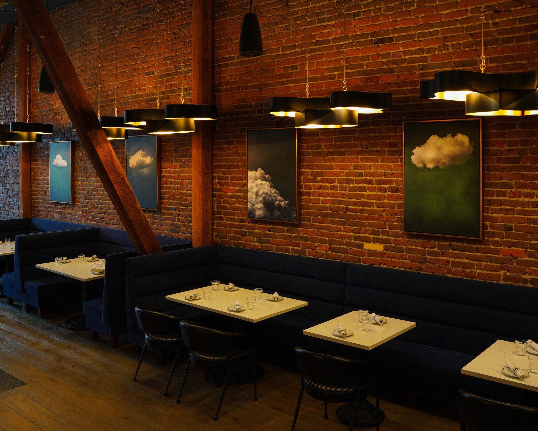 Fresh art, familiar charm—our cozy main dining room just got a dreamy je ne sais quoi. Stop by Augie's French to see what’s new. ☁️✨