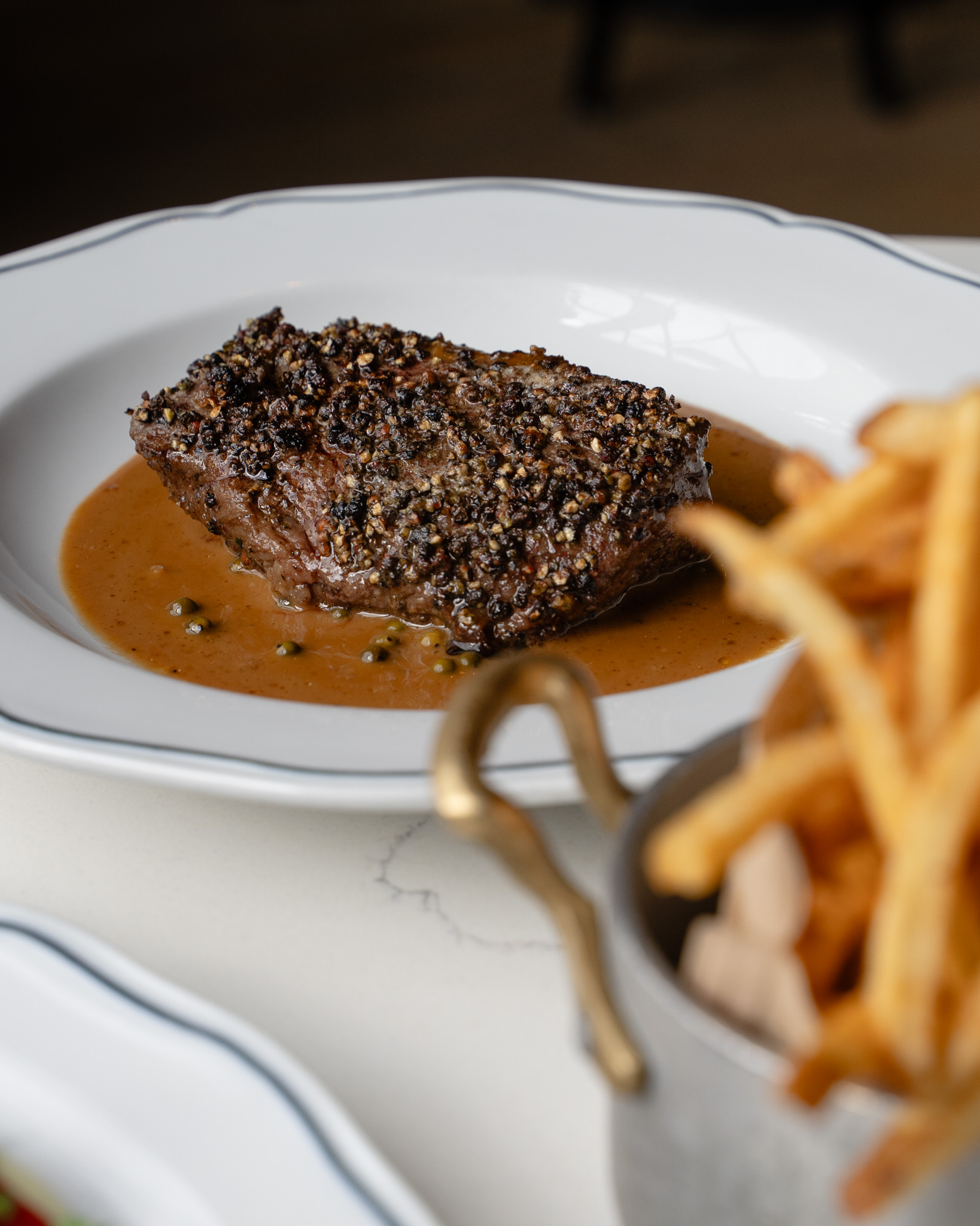 Our National Steak au Poivre Day celebration was such a hit, we couldn’t keep it off the menu. Meet our newest entrée: Steak Frites au Poivre — Wagyu Zabuton with Cognac & Peppercorn Sauce, served with frites. A little luxe, a little cozy, and officially here to stay.
📸: @savery.media
